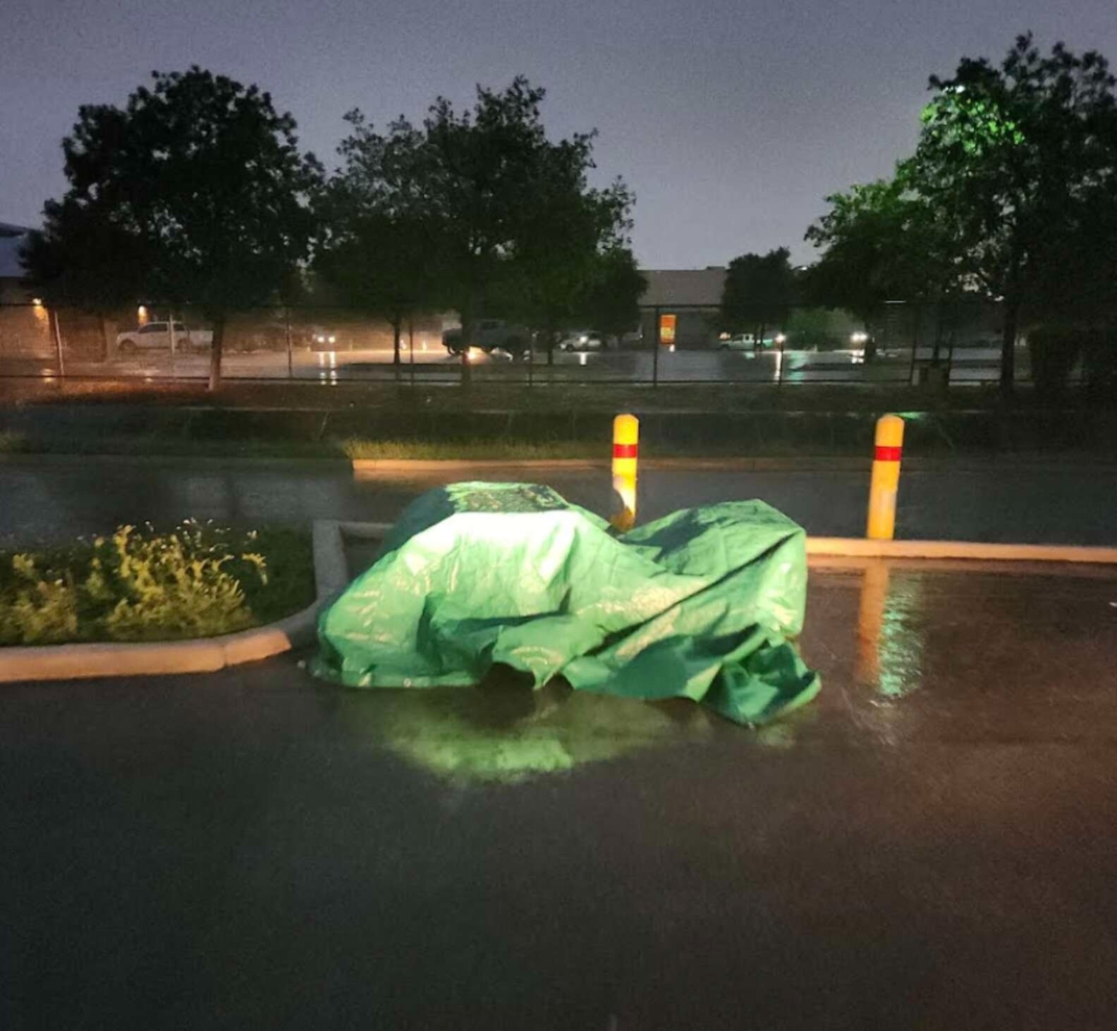 Texas Workers Arrive After Storm And Notice Green Tarp Hiding Something Moving Beneath